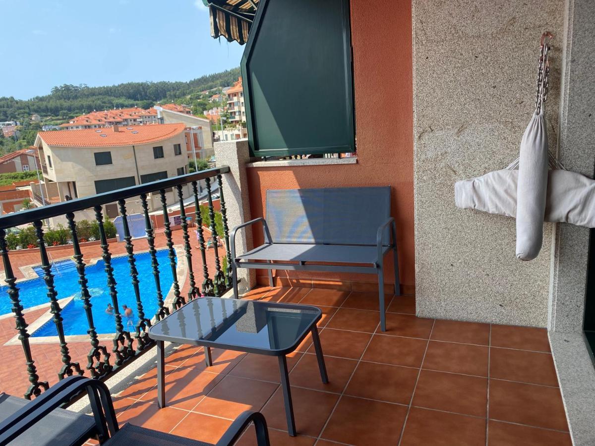 Apartamento Con Vistas Al Mar, Piscina Y Parking Apartment Sanxenxo Bagian luar foto